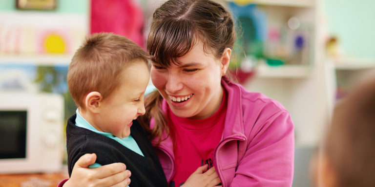 cheerful kids with disabilities in rehabilitation centre